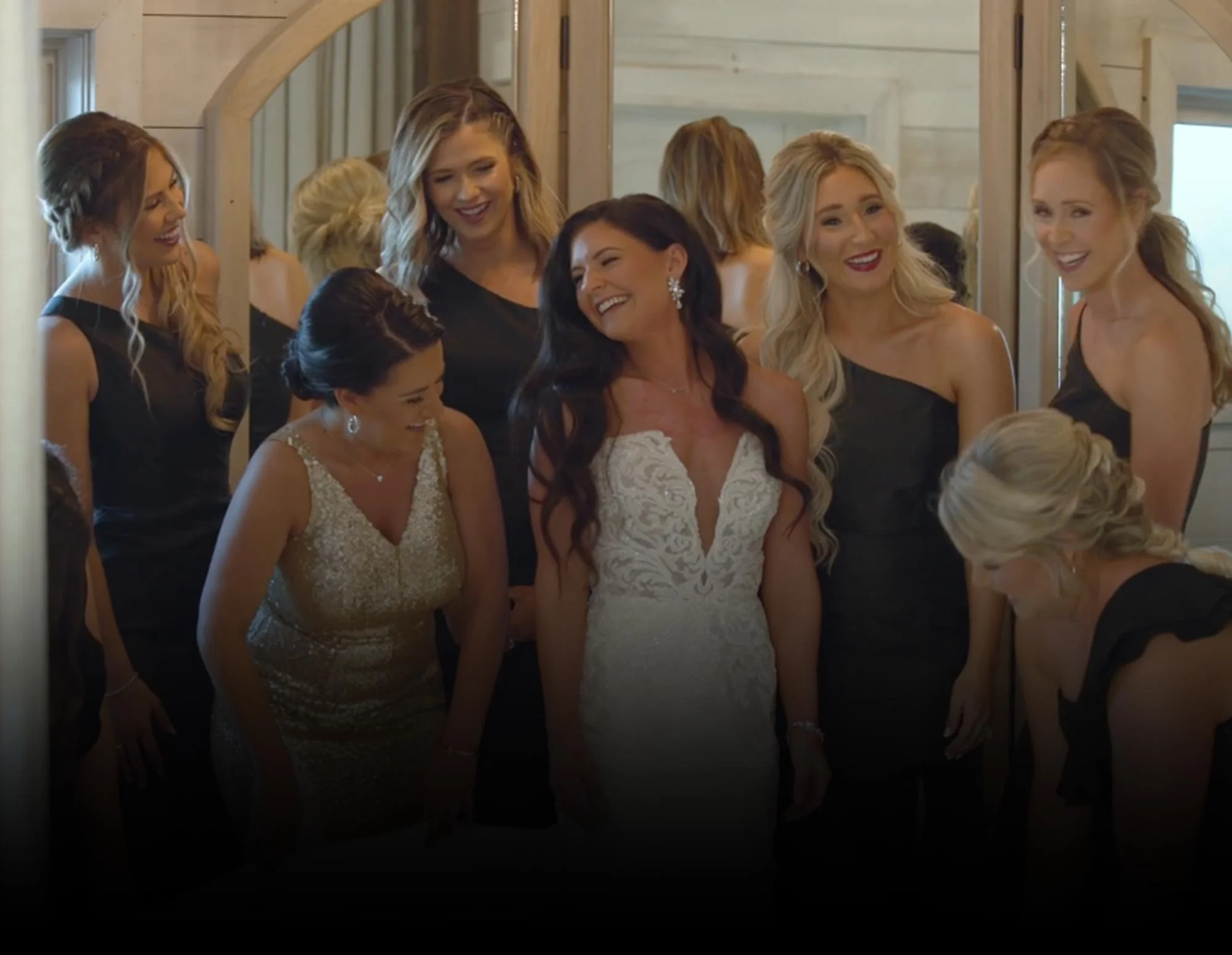 A photo of a bride and her bridal party.