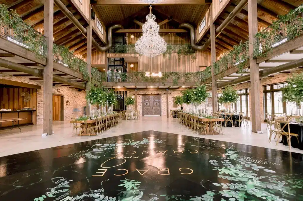 The Weinberg at Wixon Valley wedding reception with a black dance floor and monogram